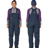 Women's navy blue waterproof bib overalls with purple thermal layer, ideal for ice fishing and cold weather outdoor activities.