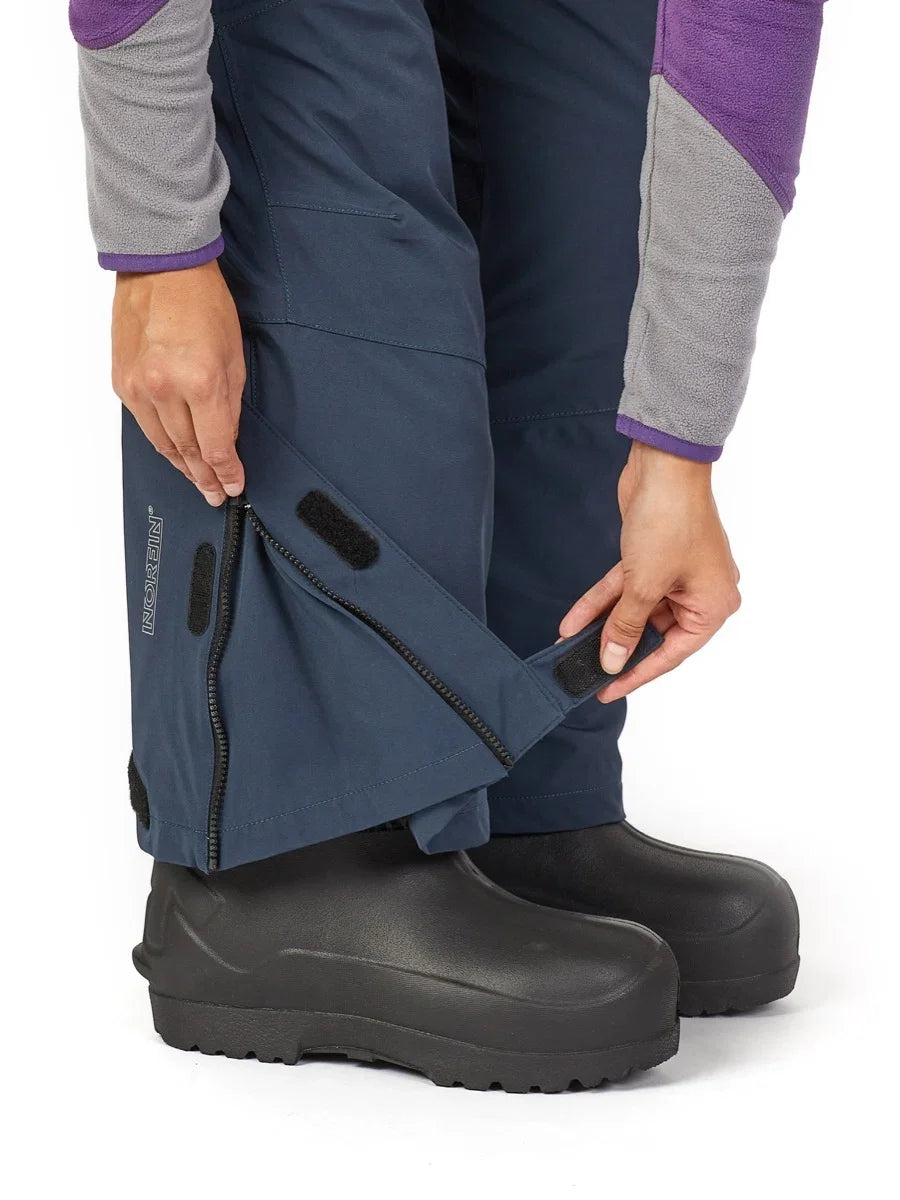 Adjustable waterproof ice fishing pants with zippered leg vents and boot gaiters for winter outdoor gear